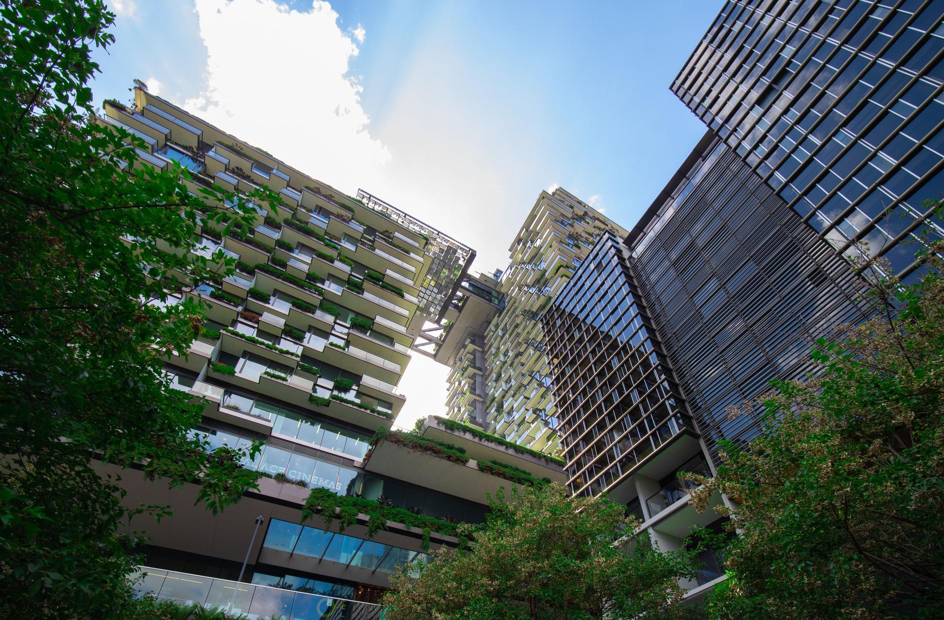 Apartment block in Sydney NSW Australia with hanging gardens and plants on exterior of the building